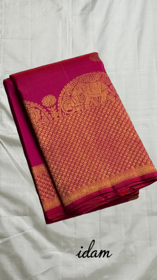 Rosette Bloom — Pure Kanchipuram Silk Saree
Vibrant rani-pink body with copper-rose zari buttas, elephant motifs & floral borders
Silk Mark Certified • Blouse Stitching ($30) • Free Shipping within USA • Ships in Two Weeks