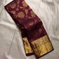 Tanvi – Coffee Brown Kanchipuram Pure Silk Saree with Floral Zari Jaal & Baavanji Border

Rich coffee brown silk adorned with delicate floral zari jaal creates a timeless elegance.
The bold Baavanji border and grand Varisaipettu pallu
