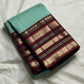 Teal Mint Muthu Kattam — Pure Silk Kanchipuram Saree
Teal-mint body with tiny  zari  buttas & plum-maroon korvai borders
Silk Mark Certified • Free USA Shipping • Ships in Two Weeks