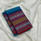 Peacock-teal body with woven silk-thread buttas in navy & coral hues
Korvai contrast ruby-maroon borders with gaja-chakram & temple motifs
Grand varisaipettu striped pallu in navy, mustard & maroon tones
Silk Mark Certified • Ships in Two Weeks