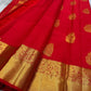 A traditional Kanjivaram (Kanchipuram) silk saree, vibrant red orange peacock floral motifs bavanji border and ornate grid motif Pallu