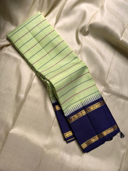 Cardamom veldhari Stripes – Pure Silk Kanchipuram Saree
Refreshing Cardamom Green Body with Stripes 🌿
Deep Purple Contrast Border in Rich Zari Weave ✨
Temple Motif Edging & Grand Lattice Pallu
Silk Mark Certified | ships two weeks