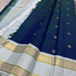 Mayil Kazhuthu ✨ – Peacock’s Neck Kanchipuram Pure Silk Saree
Korvai Royal-Purple Border with Peacock & Floral Zari Vines
Body Embellished with Gold Kamalam (Lotus) Buttas
Grand Gold Zari Pallu with Traditional Motifs & Hand-knotted Tassels
Silk Mark