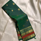 Minnal ✨ – Forest Green Kanchipuram Pure Silk Saree
with Radiant Gold Coin Buttas 🌸
Rust Korvai Varisaipet Zari Border
Grand Green Pallu with Gold Stripes & Panels