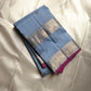 Fuchsia in Sky – Pure Silk Kanchipuram Saree
Sky Blue Body with Gold Kattam Checks & Petite Buttas
Fuchsia Contrast Petni Pallu with Zari Reku Stripes
Wide Gold Zari Border with Peacock & Temple Motifs
Silk mark certified, ships in 2 weeks