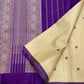 Paal Vadamalli Chakram – Pure Kanchipuram Silk Saree

Ivory body with royal-purple floral coin thread buttas

Grand purple pallu with zari panels & striped center

Handloom Double Warp Weave | Silk Mark Certified | Fall & Pico Done

Free shipping