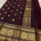 Rust Orange Coffee Brown — Flower Butta | Pure Kanchipuram Silk Saree
Rust-orange body with dainty zari-woven flower buttas and grand coffee-brown korvai borders rich in antique-gold floral medallions.
Silk Mark Certified • Blouse Stitching Available ($30