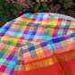 Ratna Mala ✨ – Pure Kanchipuram Silk Saree
Multicolor Checked Body in Vibrant Jewel Tones
Deep Red Korvai Border with Gold Zari Weaving
Grand Red 2gm Zari Brocade Pallu with Traditional Motifs