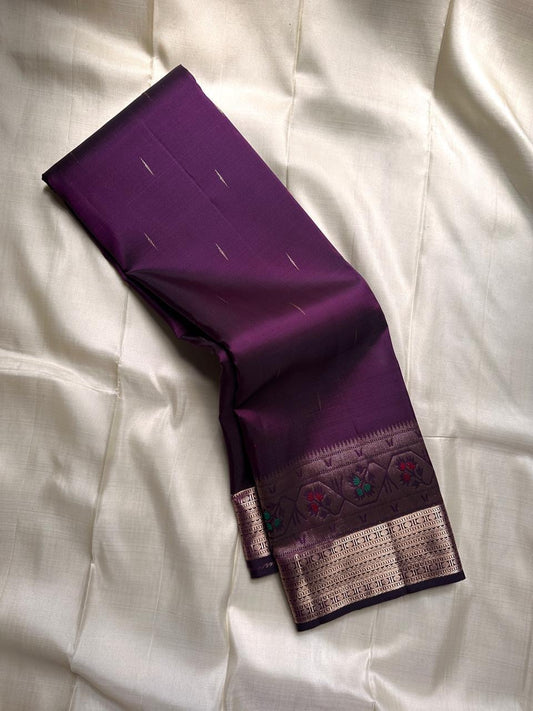 Vibha plum - A Deep Plum Pure Kanchipuram Silk Saree Blending the Grandeur of South Indian Weaving with Paithani-Inspired Floral Zari Borders and a Lustrous Rose Gold zari Pallu