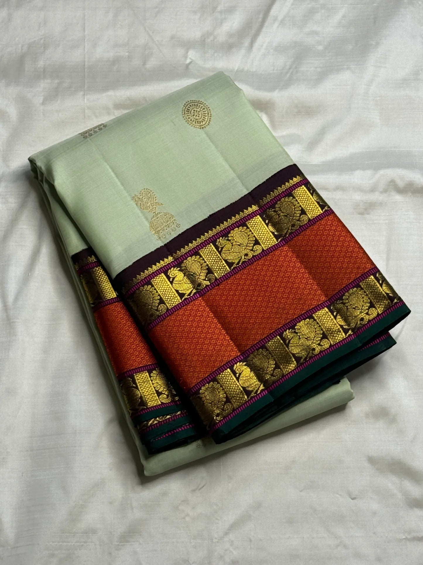 Pure Kanjivaram Silk Saree • Rettapet Yaanai Border • Pistachio Green with Rust Orange