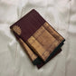 Bronze Lotus Vairaoosi
Coffee-Deep Kanchipuram Silk Saree
Grand Zari Borders • Lotus Butta Elegance