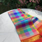 Ratna Mala ✨ – Pure Kanchipuram Silk Saree
Multicolor Checked Body in Vibrant Jewel Tones
Deep Red Korvai Border with Gold Zari Weaving
Grand Red 2gm Zari Brocade Pallu with Traditional Motifs