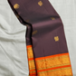 Deep Cocoa Manjari — Pure Kanchipuram Silk Saree
Rich cocoa-aubergine body with antique-gold manjari buttas, paired with a radiant kavi-orange korvai border and green selvedge accent.
Silk Mark Certified • Blouse Stitching Available ($30) • Free Shipping