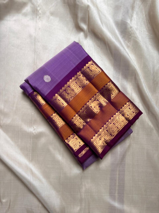 Lilac and deep purple with magenta varisaipet border in rust and vanasringaram pure silk Kanchipuram saree