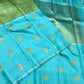 Aaral – Ice Blue & Spring Green Mubbagam Kanchipuram Pure Silk Saree with Mayil Chakram Buttas & Vanasringaram Grid Pallu