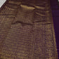 Swarna
Majestic Purple Pure Silk Kanchipuram Saree with Broad Varisaipet Zari Border,Intricately Woven Peacock and Elephant Motifs alongside border . Peacock motifs all over.