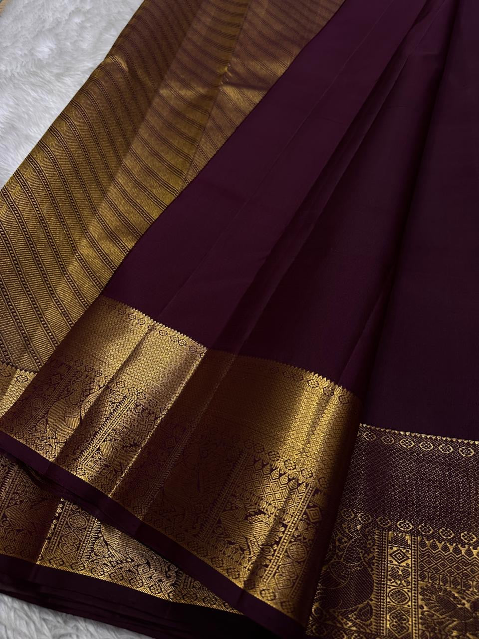 Archana – Handwoven Pure Silk Kanchipuram in Deep Brown with Gold Zari Accents & Ornate layered border