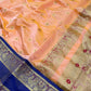 Apricot Peach Pattu Silk Chanderi saree showing Royal Blue border and intricate gold-toned pallu
