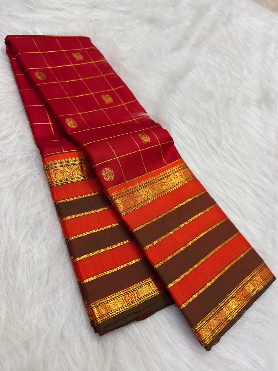 Arakku Red Handwoven Pure Silk Kancheepuram Saree with Zari Kattam Body and Grand Varisaipet Border
