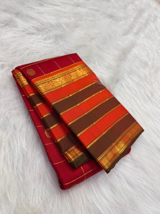 Arakku Red Handwoven Pure Silk Kancheepuram Saree with Zari Kattam Body and Grand Varisaipet Border