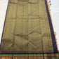 Sandal Temple – Pure Silk Kanchipuram Saree
Sandal Body with mild sheen , pillayar moggu   ✨
Indigo-Purple Korvai Border with Green & Ochre Stripes
Temple Gopuram Zari Edging & Grand Brocade Pallu
Silk Mark Certified | ships in two weeks