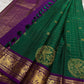 Sorgavaasal Kili – Pure Silk Kanchipuram Saree in Teal with Purple Zari Kattam
Intricately handwoven with traditional zari kattam checks and adorned with exquisite zari-woven Yazhi buttas, this saree features a vibrant teal body paired with a regal purple