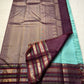 Teal Mint Muthu Kattam — Pure Silk Kanchipuram Saree
Teal-mint body with tiny  zari  buttas & plum-maroon korvai borders
Silk Mark Certified • Free USA Shipping • Ships in Two Weeks