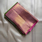 Spring green Kanchipuram silk saree with pink zari woven border, folded product view