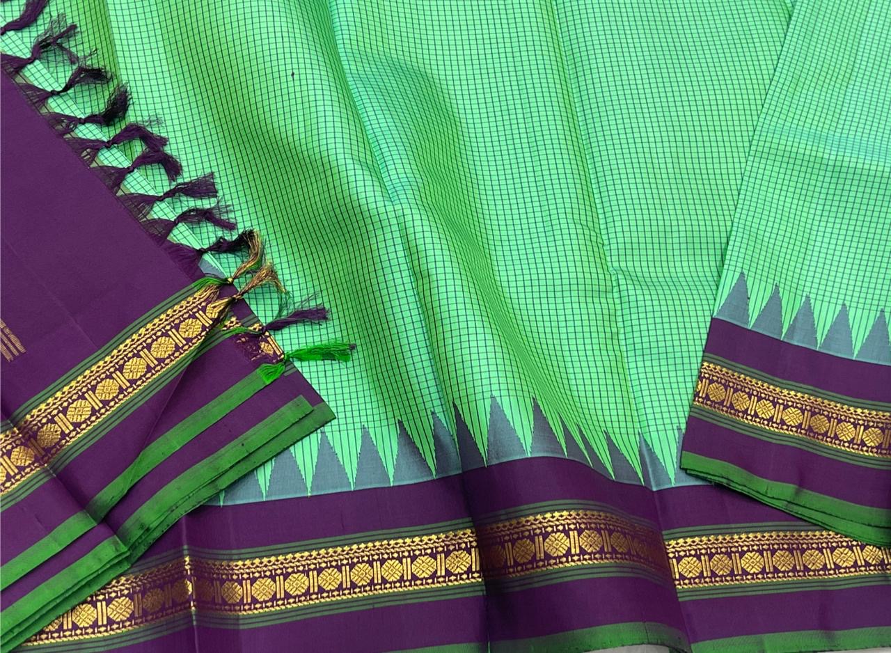 Jade Green Kattam Body • Plum-Purple Zari Border
Temple Triangles & Floral Bands
Silk Mark Certified • Free USA Shipping • Ships in Two Weeks ✅
