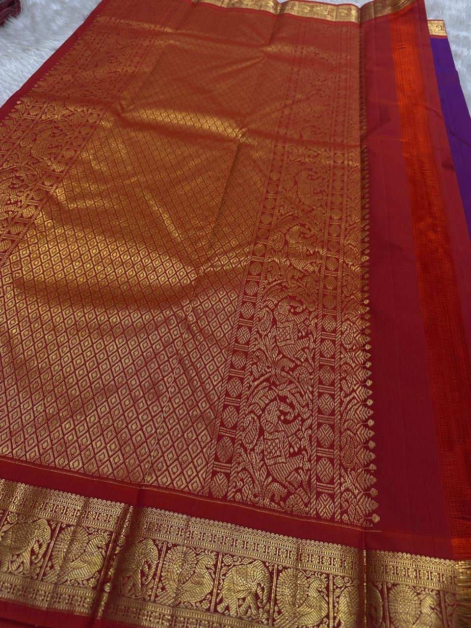 Swaram Lightweight – Berry Pink Purple
Feather-Light Berry Kanchipuram Silk Saree
Red Borders & Elephant Procession Zari
