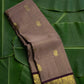 Chikoo handwoven Kanchipuram pure silk saree with zari kattam body and mayil butta on banana leaf — Idam Living