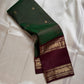 Geetham ✨
Forest Green Zari Kattam Pure Silk Kanchipuram Saree 🌿
With Ornate Rettapet Border of Peacock & Kamalam Motifs 🦚🌸
Flanked by Muthuseer Florals & Vanki Neli Columns 🌺
Finished with a Grand Brocade Maroon Pallu in Rich Zari ✨