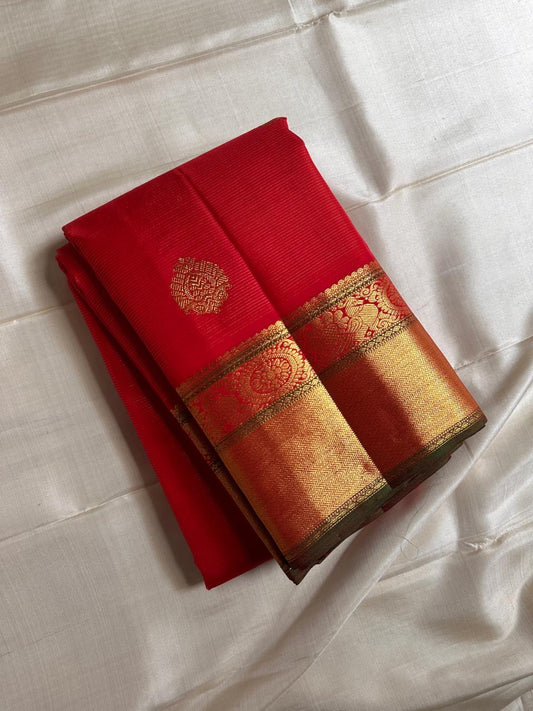 Nitya – Vibrant Red Pure Silk Kanchipuram Saree with Gold Vaira Oosi Stripes & Majestic Mayil Kamalam Border