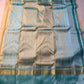 Body: pastel lemon-cream with tiny gold zari buttas

Borders/Pallu: sea-foam aqua with temple (reku) peaks & paisley vine zari

Silk Mark Certified • Free USA Shipping • Ships in Two Weeks