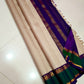 Sandal Emerald Kattam – Pure Kanchipuram Silk Saree
Micro Sandal & Ivory Checks with Korvai Emerald Green Border
Purple Selvedge with Zari Floral Detailing
Rich Purple Zari-Striped Pallu | l
Silk Mark Certified ✅ | ships in two weeks