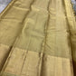 Hamsini — Cream & Gold Kanchipuram Pure Silk Saree
Featuring Exquisite Vairaoosi Zari with Peacock & Kamalam Motifs
Raised, Embossed Zari Adding Dimension and Shine
Thick Mayil-Kann Border with Luxurious Lustre & stunning border , silk mark certified