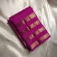 vasantham  Fuchsia pink – Handwoven Kanchipuram Silk Saree A poem in Fuchsia silk. The body glows in a serene vibrant Fuchsia, softly accented by delicate gold vertical lines and dainty gold zari buttas that glint like little blessings.