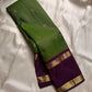 Iravati – Earthy Green Kanchipuram Pure Silk Saree
A graceful weave in a rare earthy green tone, adorned with gold zari kattam and butta.
Accented by a rich plum rettapet border with delicate flower vine motifs.