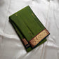 Varnam – Leaf Green Pure Kanchipuram Silk Saree with Gold Zari Buttas, Trellis Design Arakku Border, and Contrast Maroon Zari Pallu