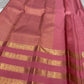 vasantham  pink – Handwoven Kanchipuram Silk Saree
A poem in pink silk. The body glows in a serene rose pink, softly accented by delicate gold vertical lines and dainty gold zari buttas that glint like little blessings.