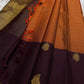 Rust Orange & Wide Broad Silk Korvai – Pure Kanchipuram Silk Saree

Deep wine body adorned with gold ambi buttas for subtle elegance

Contrast rust-orange wide korvai border with podi-kattam micro checks

Grand wine pallu with full-zari diamond jaal