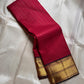 Ruby Zari Kattam – Pure Kanchipuram Silk Saree
Rich Ruby Red Body with Gold Zari Checks
Broad Golden Border with Maroon Highlights & Temple Motifs
Dual-Toned Maroon-Green Pallu with Intricate Zari Weaves

Silk Mark Certified, delivery in 2 weeks