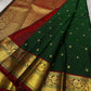 Emerald Glow ✨ – Pure Kanchipuram Silk Saree

Deep Green Body with Gold Floral Buttas

Maroon Korvai Border with Peacock & Floral Zari Motifs

Grand Gold Zari Brocade Pallu with Diamond Lattice Weave

Silk Mark Certified | Fall & Pico Done | Blouse Stitch