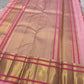 Rose-Quartz Kattam — Kanchipuram Pure Silk  Pastel baby-pink body with windowpane checks (checks )  Minimal zari buttas scattered across the body  Broad gold kaddi borders with pink meenakari accents  Silk Mark Certified | Free Shipping within USA