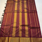 Shyama Vairaoosi — Pure Silk Kanchipuram

Deep Shyama brown with micro Vairaoosi pinstripes

Temple-column antique gold zari border, bottle-green selvedge

 Grand striped zari pallu with hand-tied tassels

Silk Mark Certified • free shipping