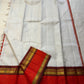 Shveta Arakku Kattam
Pure Silk Kanchipuram Saree – White Body with Fine Kattam Checks
Contrast Arakku Red Border & Maroon Korvai with Rich Zari Weave
Grand Zari Pallu Featuring Intricate Traditional Motifs
Silk Mark Certified ✅ Fall & Pico Done