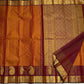 Ushas — Rust Orange Pure Kanchipuram Silk Saree
Radiant Rust Orange Oosi Kattam body with ornate Paisley 2gm Zari ✨
Arakku Red Vanasringaram, Muthuseer & Kamalam border with Fishpettu 
Exquisite Arakku Red diamond-pet grid Zari pallu green selvedge
