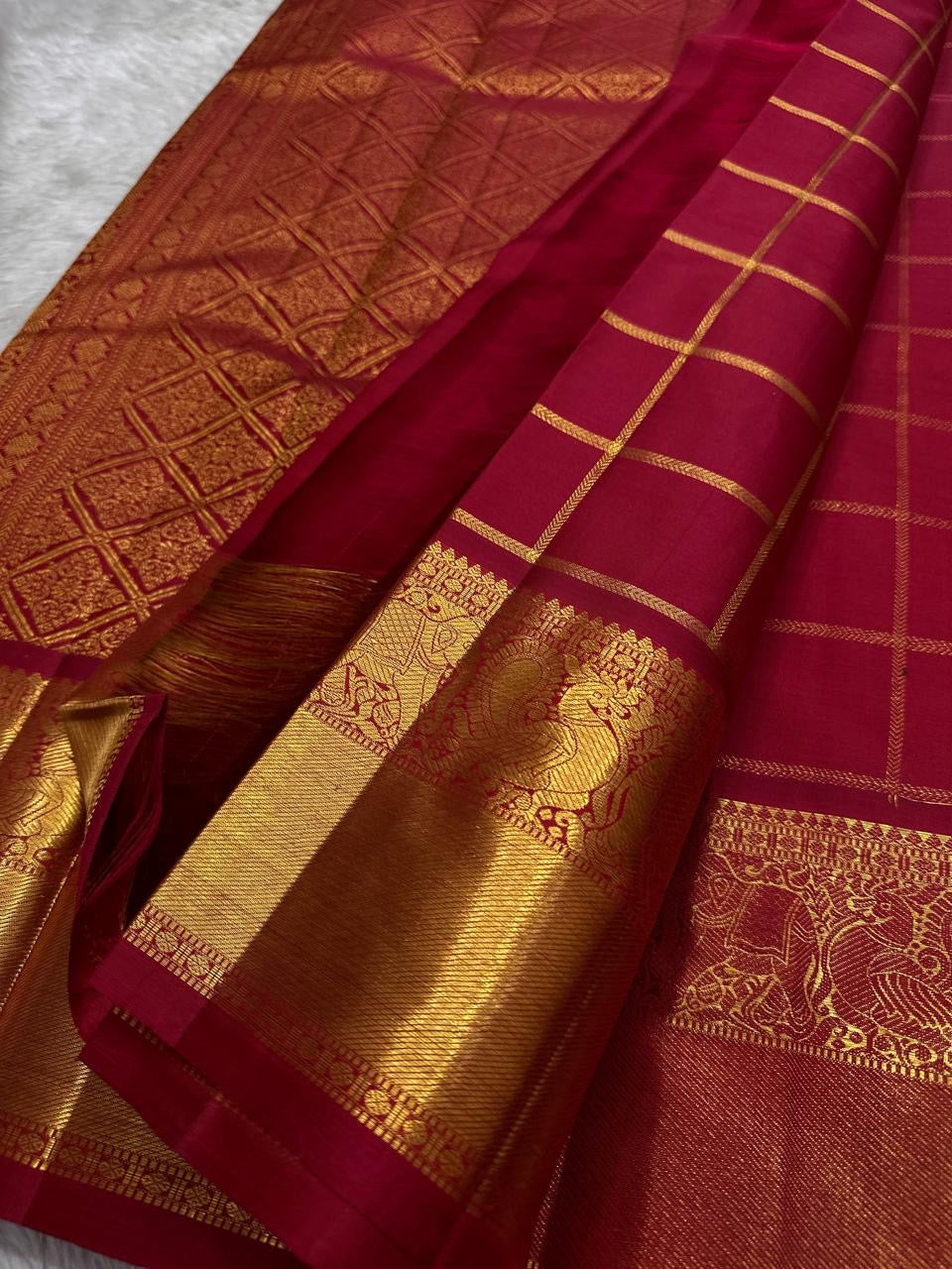 Leelavati Kattam Red
Kumkum-Red Kanchipuram Silk Saree
Zari Kattam Checks & Elephant Procession Border