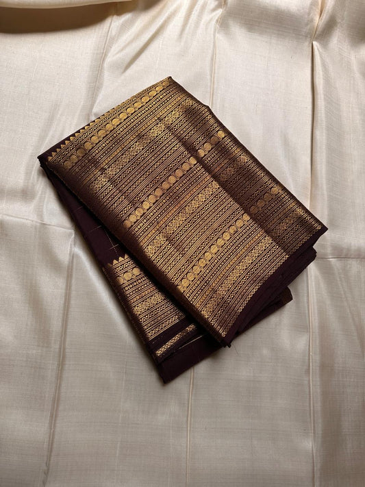 Brown Zari kattam with ornate border pure silk Kanchipuram with mayil chakram zari butta and detailed Pallu