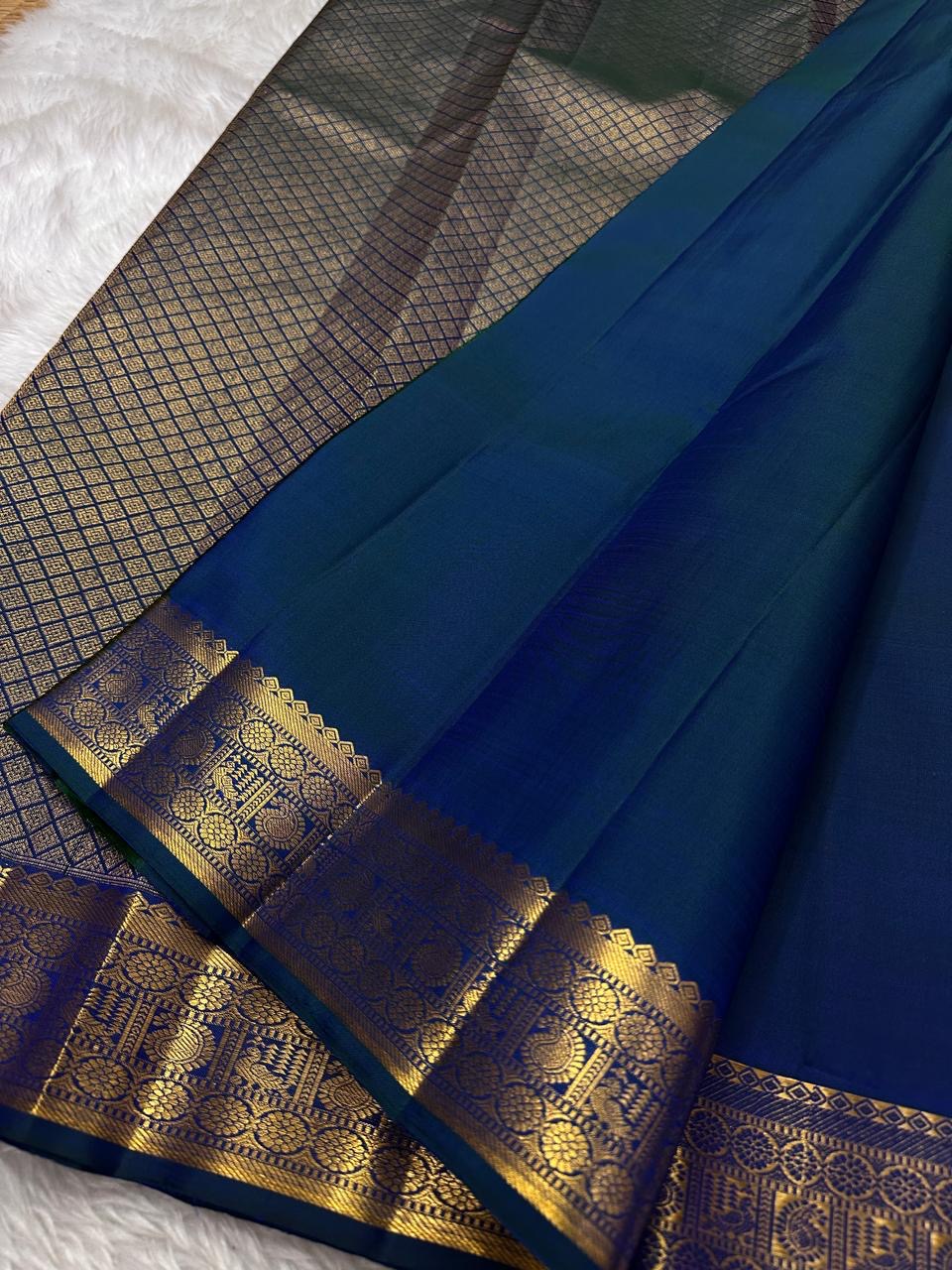 Indira – Peacock Blue-Green Kanchipuram Pure Silk Saree with Zari Butta & muthu seer and rudraksham Pettu  Border